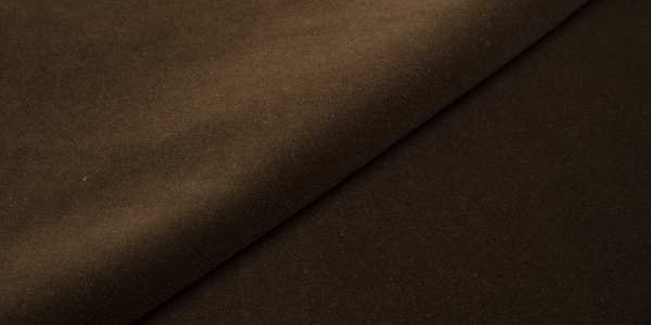 Brown Ritz fabric texture close-up.