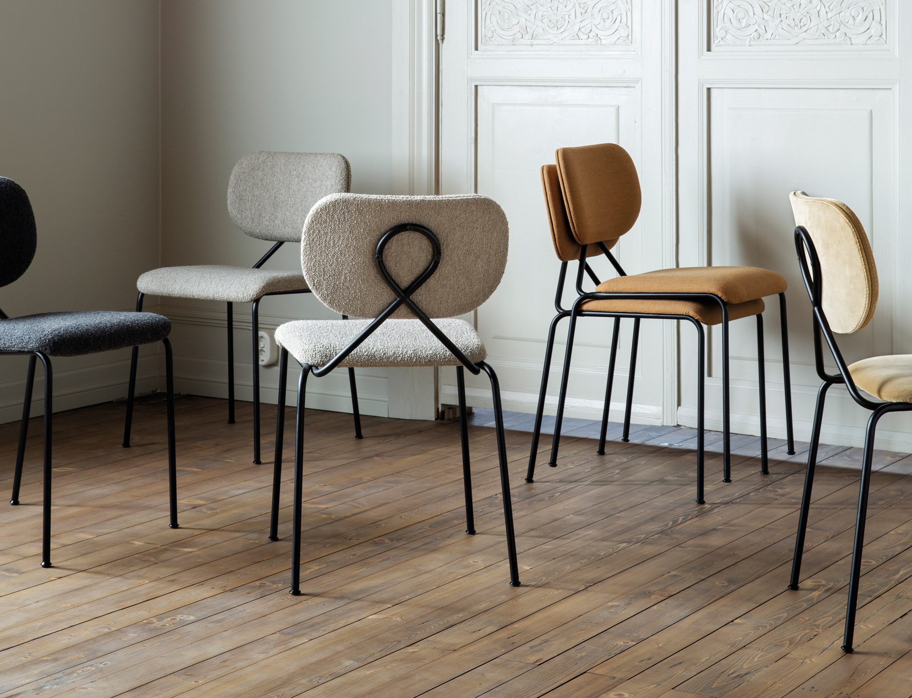 Løkke dining chairs in different fabrics.